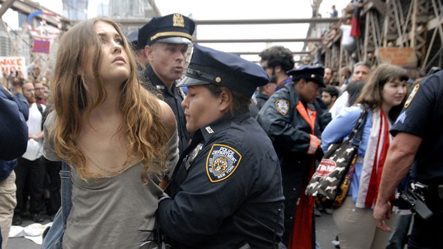 http://www.bagnewsnotes.com/files/2011/10/Occupy-Wall-Street-Pretty-Girl-Arrested1.jpg