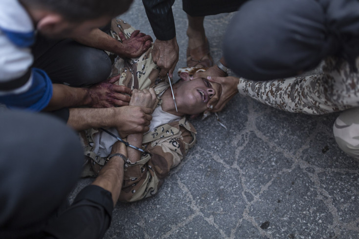 [Image: Syrian-Execution-knife-TIME.jpg]